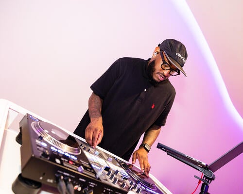 Charlotte, NC, spinner DJ RaQuest kept the music vibing before and after the performance by Nile Rodgers & Chic