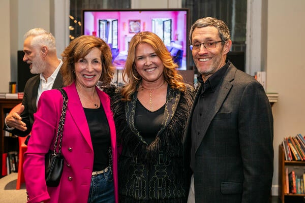 Kendall Wilkinson (center) with Nanette and Dan Jacobsen