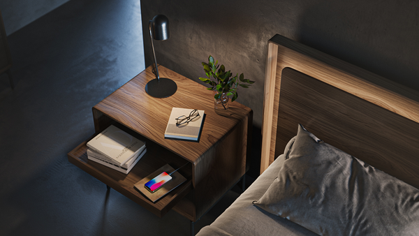 Up-Linq bed shown with integrated lighting in the headboard and pull-out drawer on nightstand