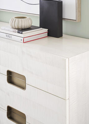 The Splendor dresser in a Sea Salt finish over figured maple veneers elevates the appeal of white