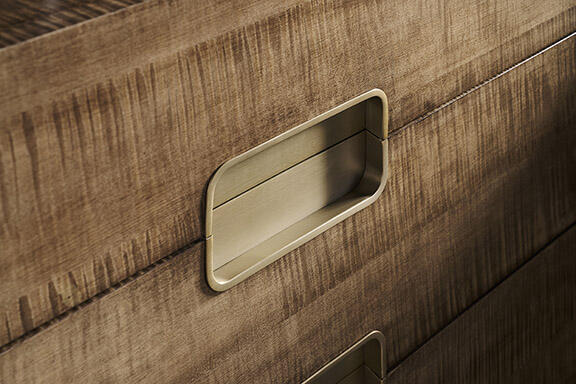 Soft Bronze metal accents are the perfect complement to bleached figured maple, shown here in Latte