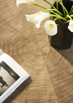 Exquisite figured maple veneers are matched to perfection in the Splendor stocked cocktail table