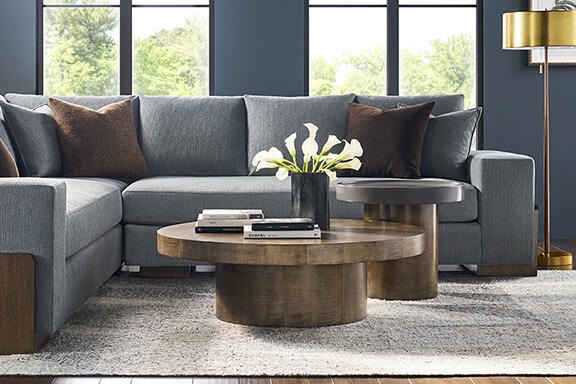 The Splendor stocked cocktail table and Splendor end table combine form and function