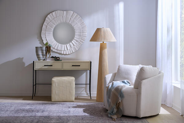 Millstone mirror, Nevado console, woven leather ottoman, Undulation vase, Tension floor lamp