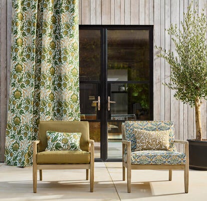 Elmcote weave on drapery and left pillow, Amble on left chair, Bellflower weave on right chair