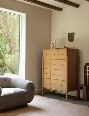 The Hawser dresser showcases sculptural turned legs that frame a clean-lined case