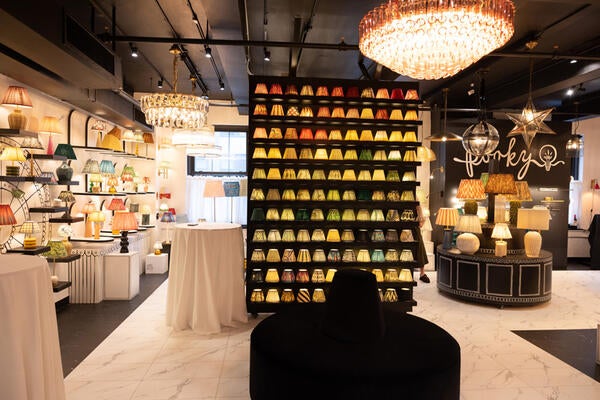 A rainbow of sconce lampshades