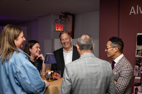 Guests enjoying cocktails by Pinch Food Design