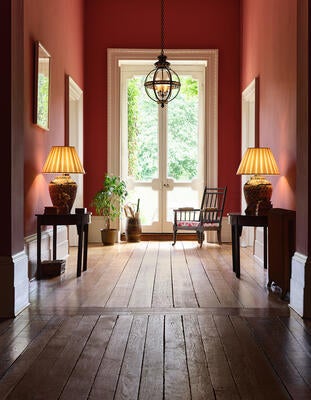 Fernhurst globe: A bronzed, orb-shaped fixture complemented by decorative gilt detail