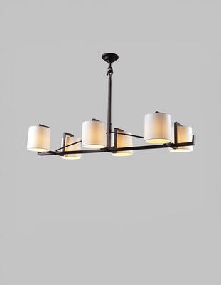 Chale chandelier: Hand-fabricated from steel and iron with cast charming but naive jointing