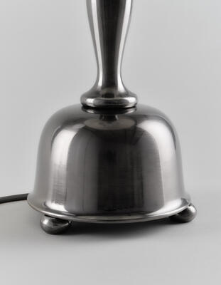 Hayling table lamp: Its antiqued nickel finish emulates the hues of antique silver