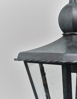 Vernham lantern: A copper bronze light with decorative trim and seeded glass