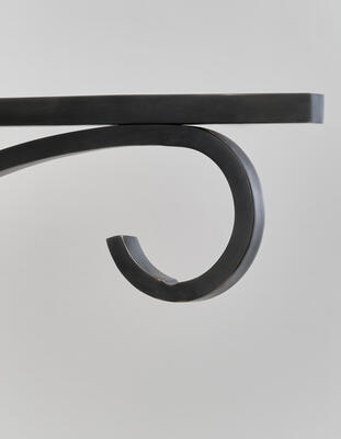 External wall bracket detail: Made from tubular solid brass in a dark bronze finish 