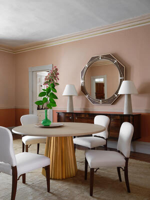 The new Sunburst dining table, Sienna dining chairs, Giovanni mirror and Faux Bois lamp