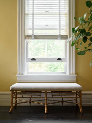 The new Gilt bamboo bench comes ready-to-ship in cream performance linen upholstery 