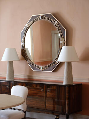 Generously scaled, the Giovanni combines a round mirror and an octagonal frame