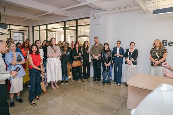 Guests listened to remarks welcoming them to the lunch