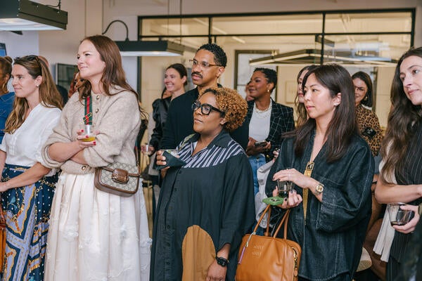 Guests listened to remarks from the hosts