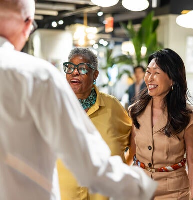 Patti Carpenter chats with fellow guests 