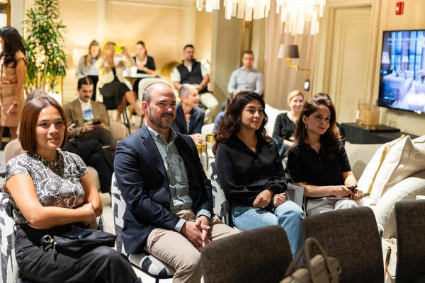 Guests listened to the panelists discuss collaboration in its many forms