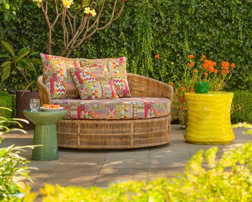 Fowler swivel daybed, Omer drink table, Pearson side table