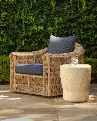 Corbetta swivel lounge chair, Jones stool