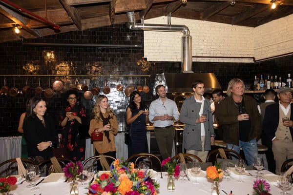 Guests listen to opening remarks