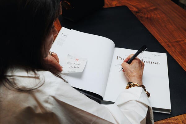 Penny Drue Baird signs copies of her new book, "PowerHouse"