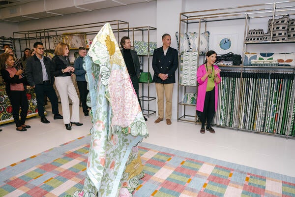 Michal Silver welcomes guests to the new Christopher Farr Cloth showroom at the NYDC