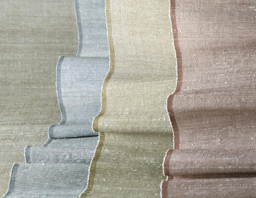 Soft blue, green and burgundy infuse grassweave Essence windowcoverings with a modern calm 