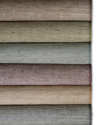 Glimmer, a luminous weave renewed in six modern hues—blue, green, burgundy, gold, brown and black