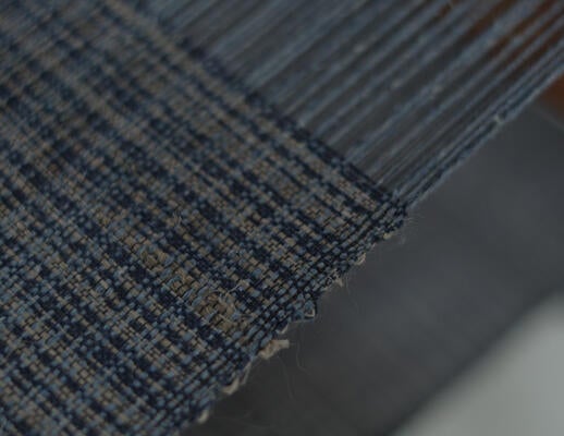 Genoa, a new Studio Concepts design handwoven from ramie and reclaimed denim