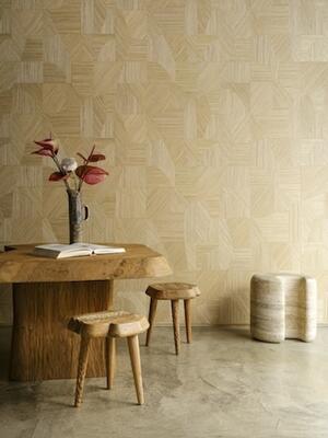 Reflect consists of narrow, hand-dyed raffia strips woven, cut and inlaid in a geometric pattern