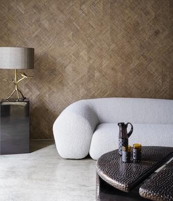 Rutile consists of wide strips of handwoven raffia inlaid to create a dynamic pattern 