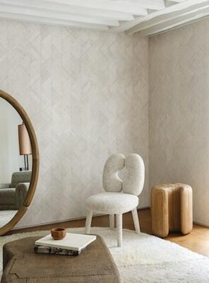 Rutile consists of wide strips of handwoven raffia inlaid to create a dynamic pattern