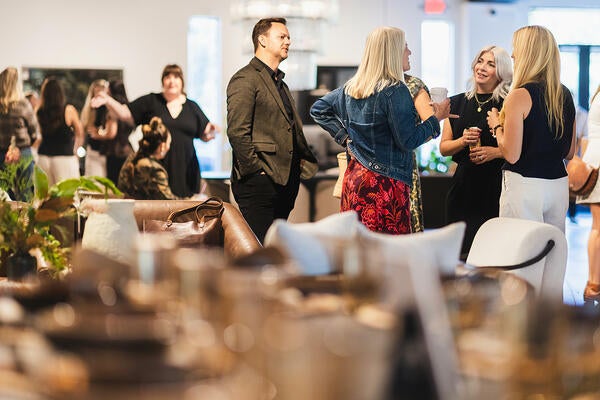 Guests mingling before the event