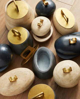 Caillou and Bocal lidded pots in black marble and travertine