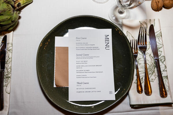 A branded dinner menu was placed at each table setting
