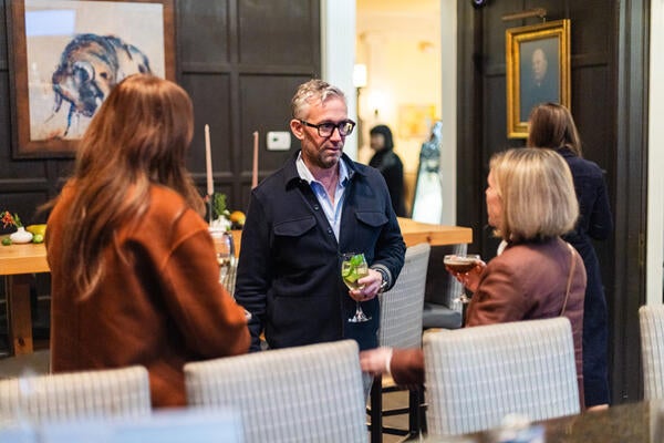 Jeff Barish chatting with guests