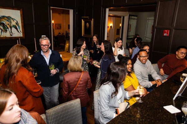 Guests gather for cocktails before the dinner