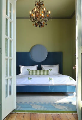 Custom Palmetto bed, Ola rug and Titali duvet set