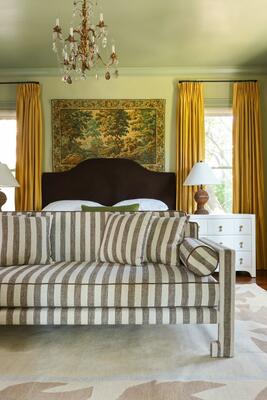 Janou sofa in Chocolate Stripe, Paloma rug and Charlie chest