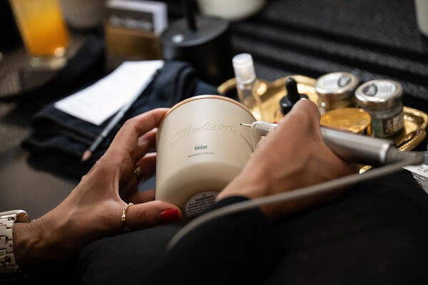 Guests received custom-engraved candles inspired by TileBar’s product array