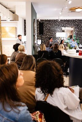 Guests listening to the panel