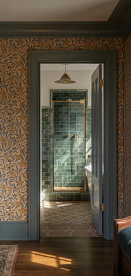 Hunter Green Subway Tile pairs perfectly with custom mosaic patterned flooring.