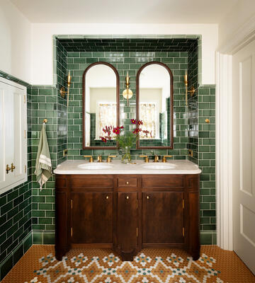 Make a statement with Hunter Green Subway Tile and Custom Mosaic Viva Tile.
