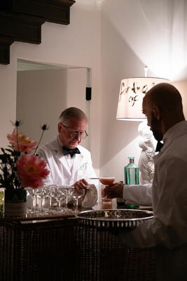 Guests enjoyed cocktails inspired by Elsie de Wolfe’s recipes. The shade on the lamp at the bar read "For the love of Elsie!"