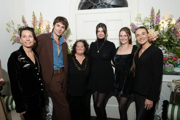 Colette van den Thillart (left) and her team—Nolan Bryant, Nanci Traynor, Taylor O’Driscoll and Jen Walker—with Benjamin Moore’s Danielle Dent