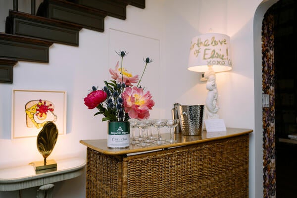 The Benjamin Moore paint can labels featured colors from Colette's selection inspired by Elsie de Wolfe