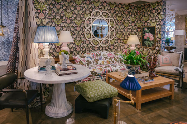 A cozy vignette of florals at John Rosselli & Associates